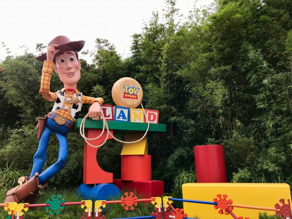 Woody is there at the entrance to meet you at Toy Story Land 